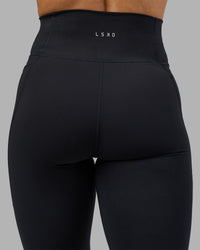 Woman wearing Fusion Ultra High-Rise Full Length Legging Pockets - Black | Model:Georgia | Size:S | Thumbnail Index: 7