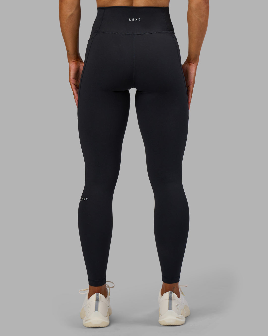 Woman wearing Fusion Ultra High-Rise Full Length Legging Pockets - Black | Model:Georgia | Size:S - view 4