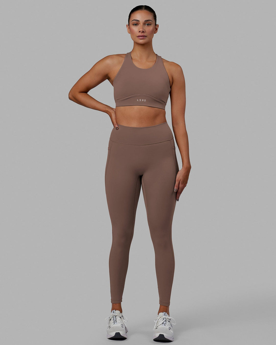 Woman wearing Fusion Ultra High-Rise Full Length Legging Pockets - Deep Taupe | Model:Blaize | Size:S - view 2