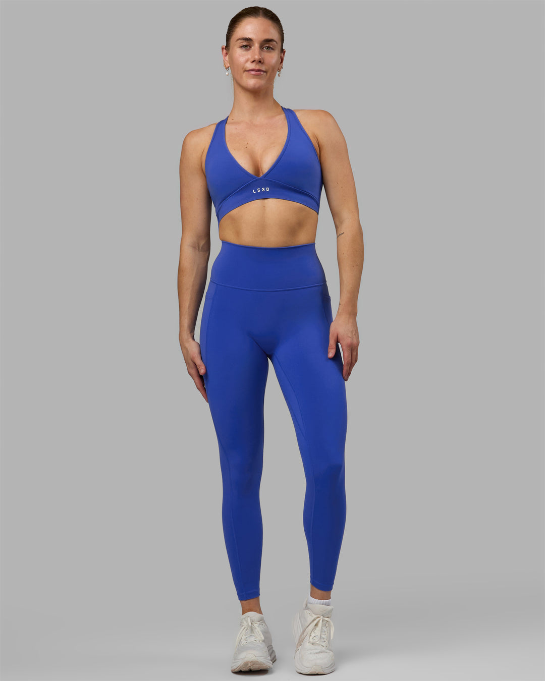 Woman wearing Fusion Ultra High-Rise Full Length Legging Pockets - Power Cobalt | Model:Hannah | Size:S - view 5