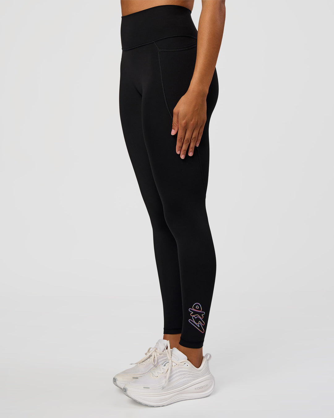 Woman wearing Fusion Graphic Ultra High-Rise Full Length Legging Pockets - Black-Radiate | Model:Rosie | Size:S - view 4
