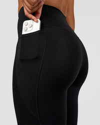 Woman wearing Fusion Graphic Ultra High-Rise Full Length Legging Pockets - Black-Radiate | Model:Rosie | Size:S | Thumbnail Index: 2
