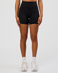 Woman wearing Fusion Graphic Ultra High-Rise 6" Short Pockets - Black-Radiate | Model:Rosie | Size:S | Thumbnail Index: 1