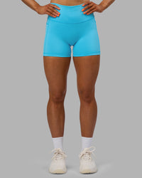 Woman wearing Fusion High-Rise 4" Short Pockets - Blue Atoll | ModelGeorgia | Size:S | Thumbnail Index: 2