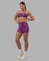 Woman wearing Fusion High-Rise 4" Short Pockets - Pink Luminous | Model:Hannah | Size:S | Thumbnail Index: 1