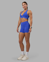 Woman wearing Fusion High-Rise 4" Short Pockets - Power Cobalt | Model:Hannah | Size:S | Thumbnail Index: 4