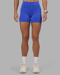 Woman wearing Fusion High-Rise 4" Short Pockets - Power Cobalt | Model:Hannah | Size:S | Thumbnail Index: 6