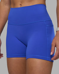 Woman wearing Fusion High-Rise 4" Short Pockets - Power Cobalt | Model:Hannah | Size:S | Thumbnail Index: 5