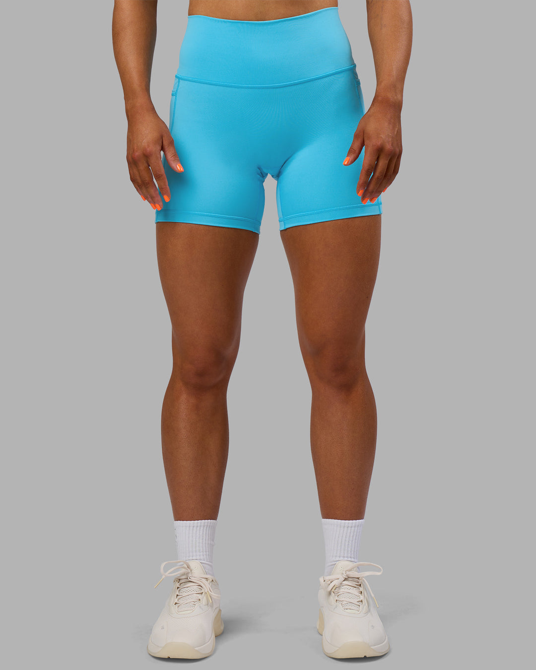 Woman wearing Fusion High-Rise 6" Short Pockets - Blue Atoll | Model:Georgia | Size:S - view 7