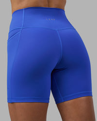Woman wearing Fusion High-Rise 6" Short Pockets - Power Cobalt | Model:Hannah | Size:S | Thumbnail Index: 7