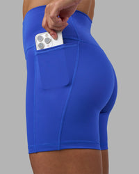 Woman wearing Fusion High-Rise 6" Short Pockets - Power Cobalt | Model:Hannah | Size:S | Thumbnail Index: 5