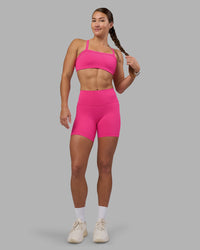Woman wearing Fusion High-Rise 6" Short Pockets - Ultra Pink | Model:Hannah | Size:S | Thumbnail Index: 1