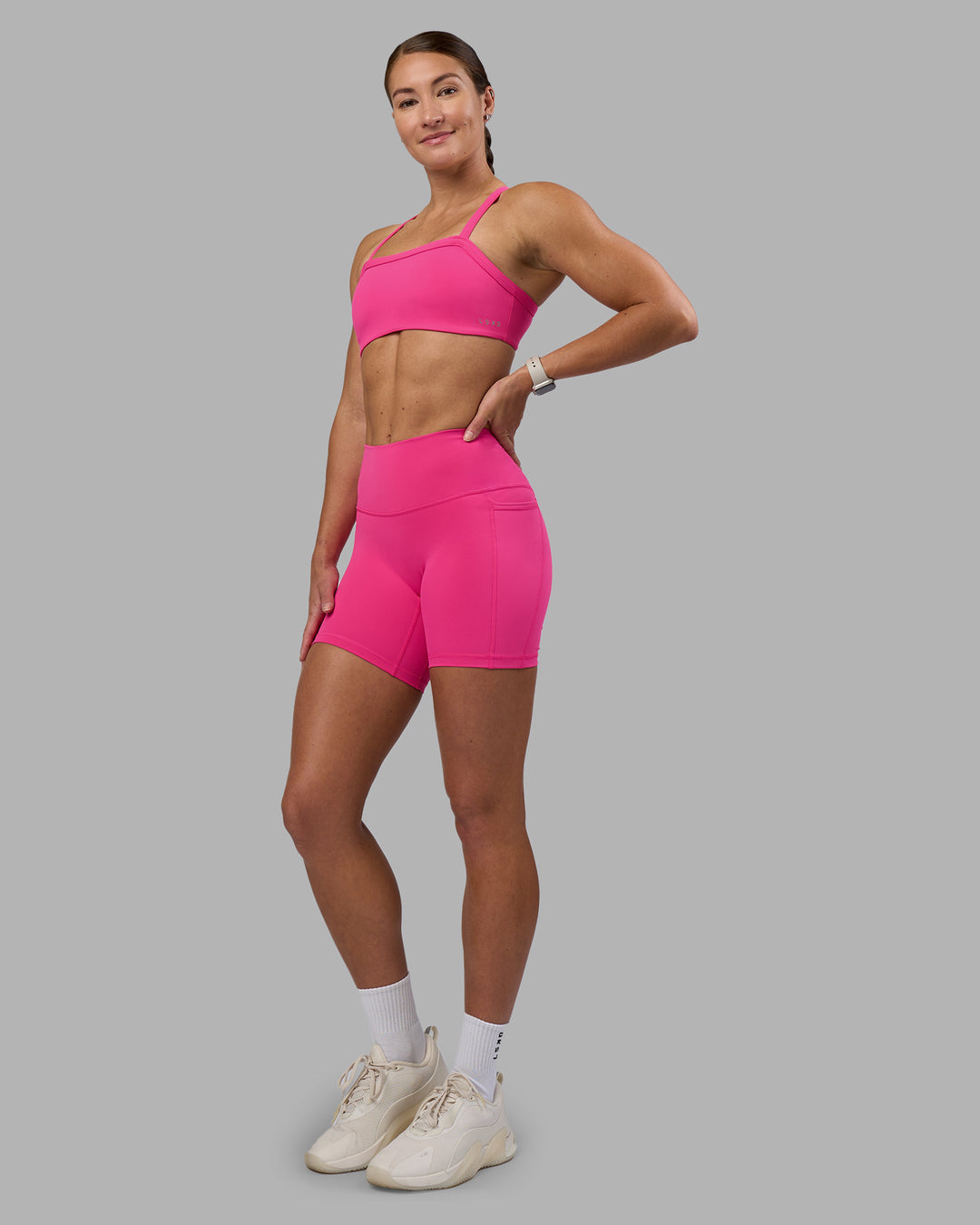Woman wearing Fusion High-Rise 6" Short Pockets - Ultra Pink | Model:Hannah | Size:S - view 5