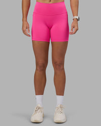 Woman wearing Fusion High-Rise 6" Short Pockets - Ultra Pink | Model:Hannah | Size:S | Thumbnail Index: 6