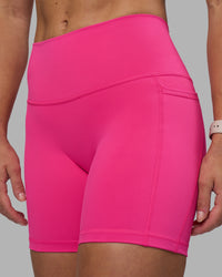 Woman wearing Fusion High-Rise 6" Short Pockets - Ultra Pink | Model:Hannah | Size:S | Thumbnail Index: 5