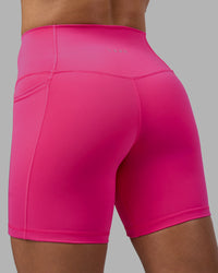 Woman wearing Fusion High-Rise 6" Short Pockets - Ultra Pink | Model:Hannah | Size:S | Thumbnail Index: 7