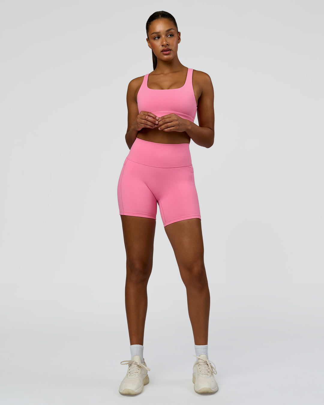 Woman wearing Fusion High-Rise 6" Short Pockets - Candy Pink | Model:Rosie | Size:S - view 4