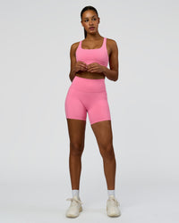 Woman wearing Fusion High-Rise 6" Short Pockets - Candy Pink | Model:Rosie | Size:S | Thumbnail Index: 3