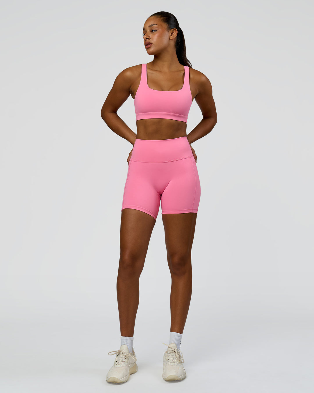 Woman wearing Fusion High-Rise 6" Short Pockets - Candy Pink | Model:Rosie | Size:S - view 5