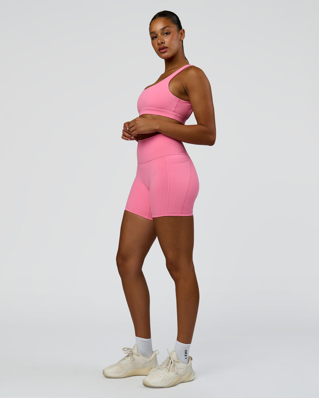 Woman wearing Fusion High-Rise 6" Short Pockets - Candy Pink | Model:Rosie | Size:S - view 6