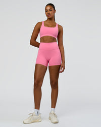 Woman wearing Fusion High-Rise 4" Short Pockets - Candy Pink | Model:Rosie | Size:S | Thumbnail Index: 4