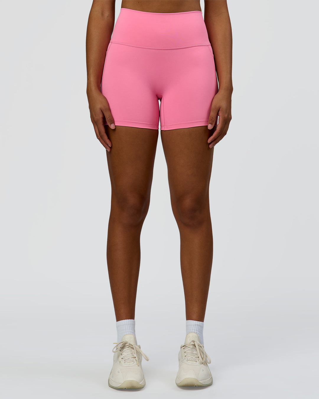Woman wearing Fusion High-Rise 4" Short Pockets - Candy Pink | Model:Rosie | Size:S - view 6
