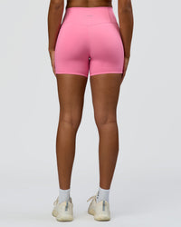 Woman wearing Fusion High-Rise 4" Short Pockets - Candy Pink | Model:Rosie | Size:S | Thumbnail Index: 3
