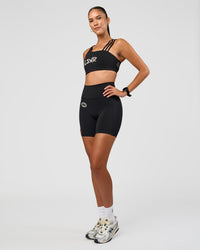 Woman wearing Fusion Hype Graphic Ultra High-Rise 6" Short Pockets - Black-Alloy | Model:Rhiley | Size:S | Thumbnail Index: 6
