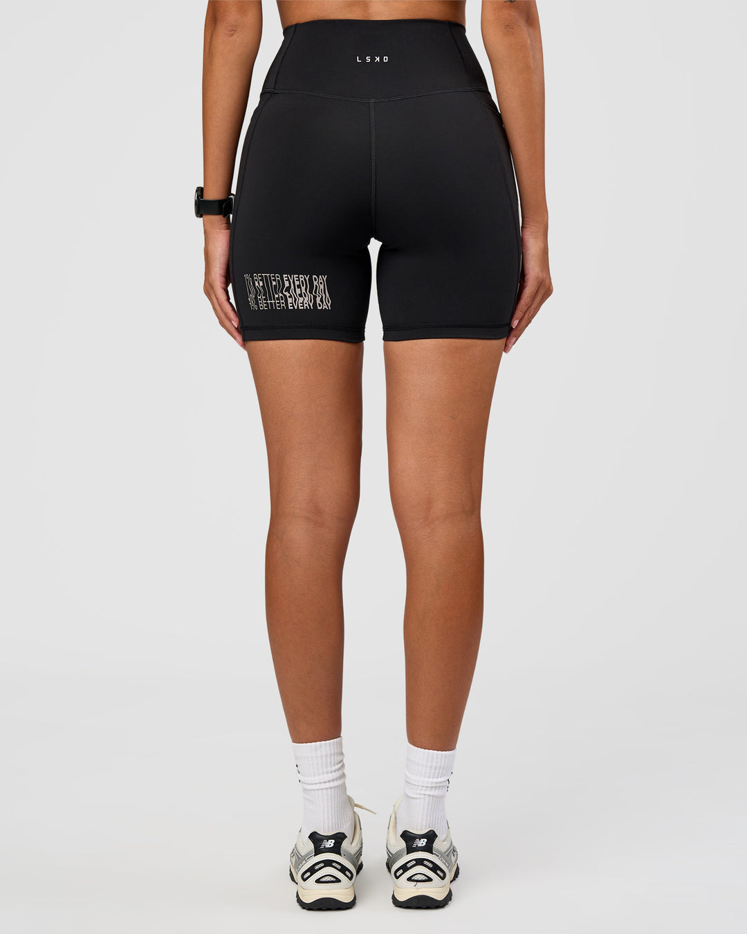 Woman wearing Fusion Hype Graphic Ultra High-Rise 6" Short Pockets - Black-Alloy | Model:Rhiley | Size:S - view 10
