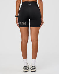 Woman wearing Fusion Hype Graphic Ultra High-Rise 6" Short Pockets - Black-Alloy | Model:Rhiley | Size:S | Thumbnail Index: 9