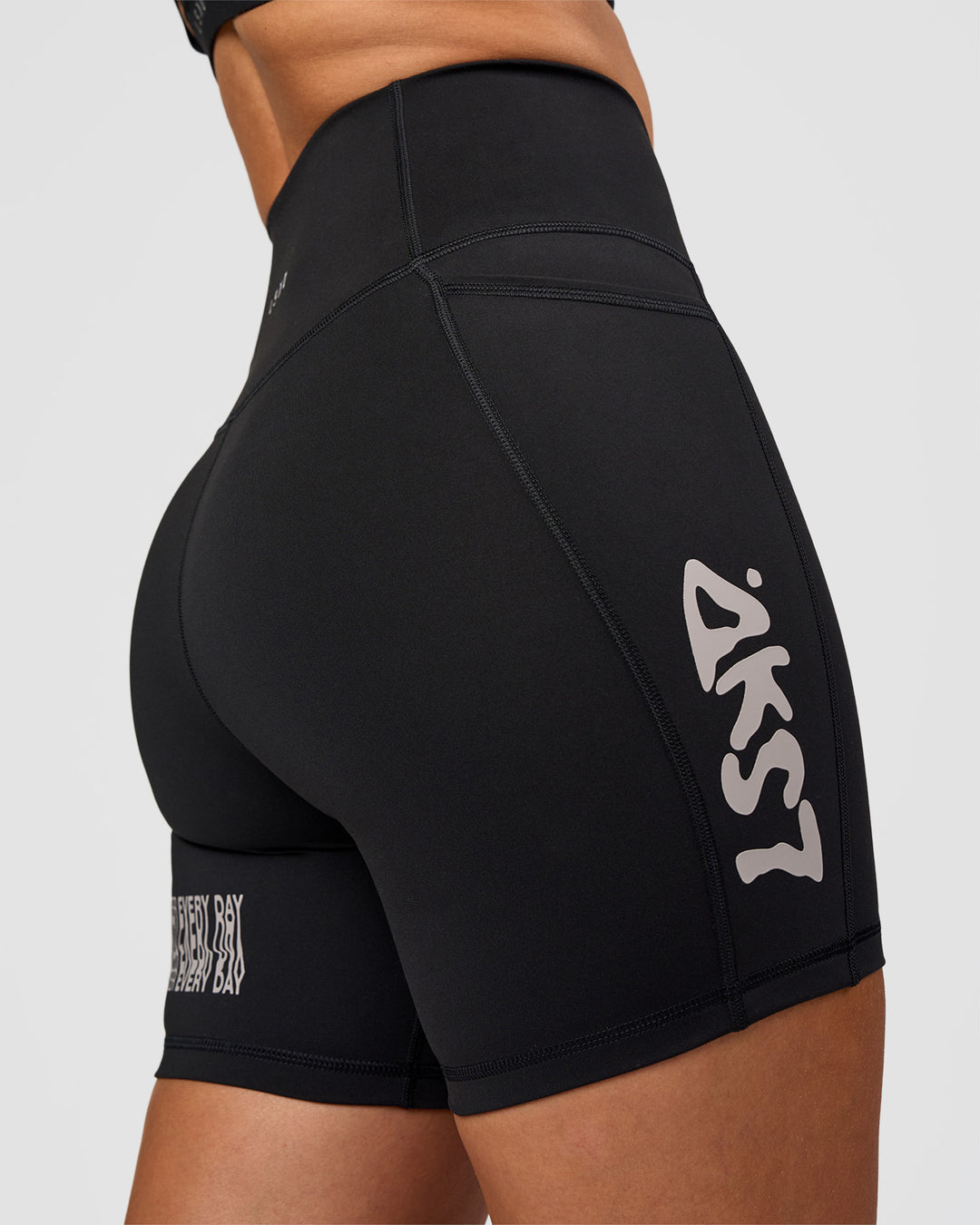 Woman wearing Fusion Hype Graphic Ultra High-Rise 6" Short Pockets - Black-Alloy | Model:Rhiley | Size:S - view 9