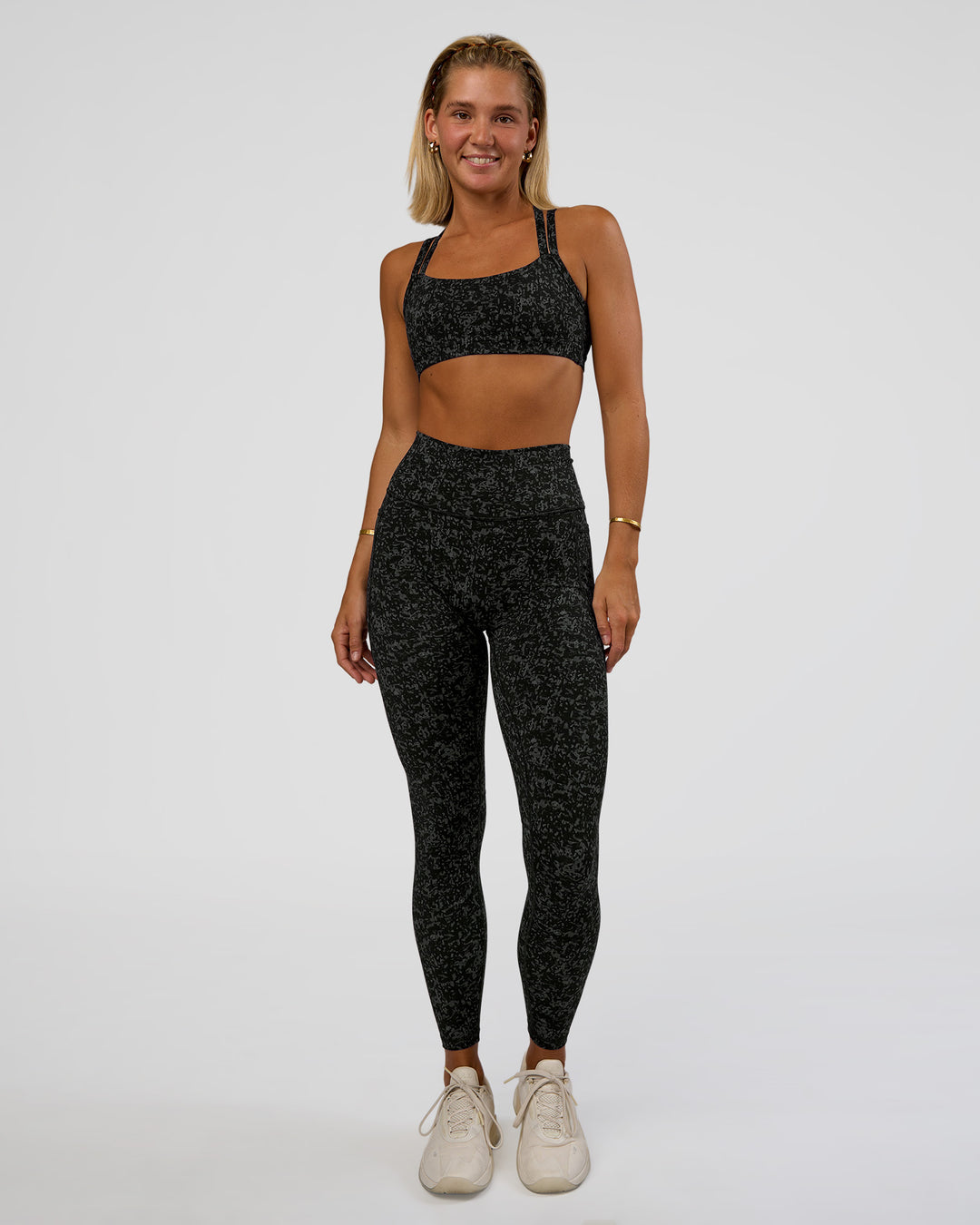 Woman wearing Fusion Icon Ultra High-Rise Full Length Legging Pockets - Energy Print Black-Reflective | Model:Amity | Size:S - view 3