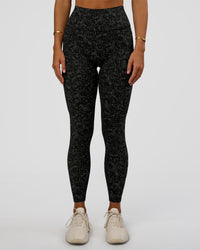 Woman wearing Fusion Icon Ultra High-Rise Full Length Legging Pockets - Energy Print Black-Reflective | Model:Amity | Size:S | Thumbnail Index: 6