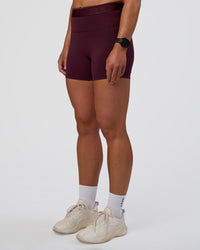Woman wearing Fusion Jacquard High-Rise 4” Short Pockets - Cherry Lacquer | Model:Sav | Size:S | Thumbnail Index: 7