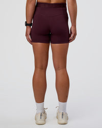 Woman wearing Fusion Jacquard High-Rise 4” Short Pockets - Cherry Lacquer | Model:Sav | Size:S | Thumbnail Index: 2