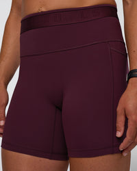 Woman wearing Fusion Jacquard High-Rise 6" Short Pockets - Cherry Lacquer | Model:Sav | Size:S | Thumbnail Index: 6