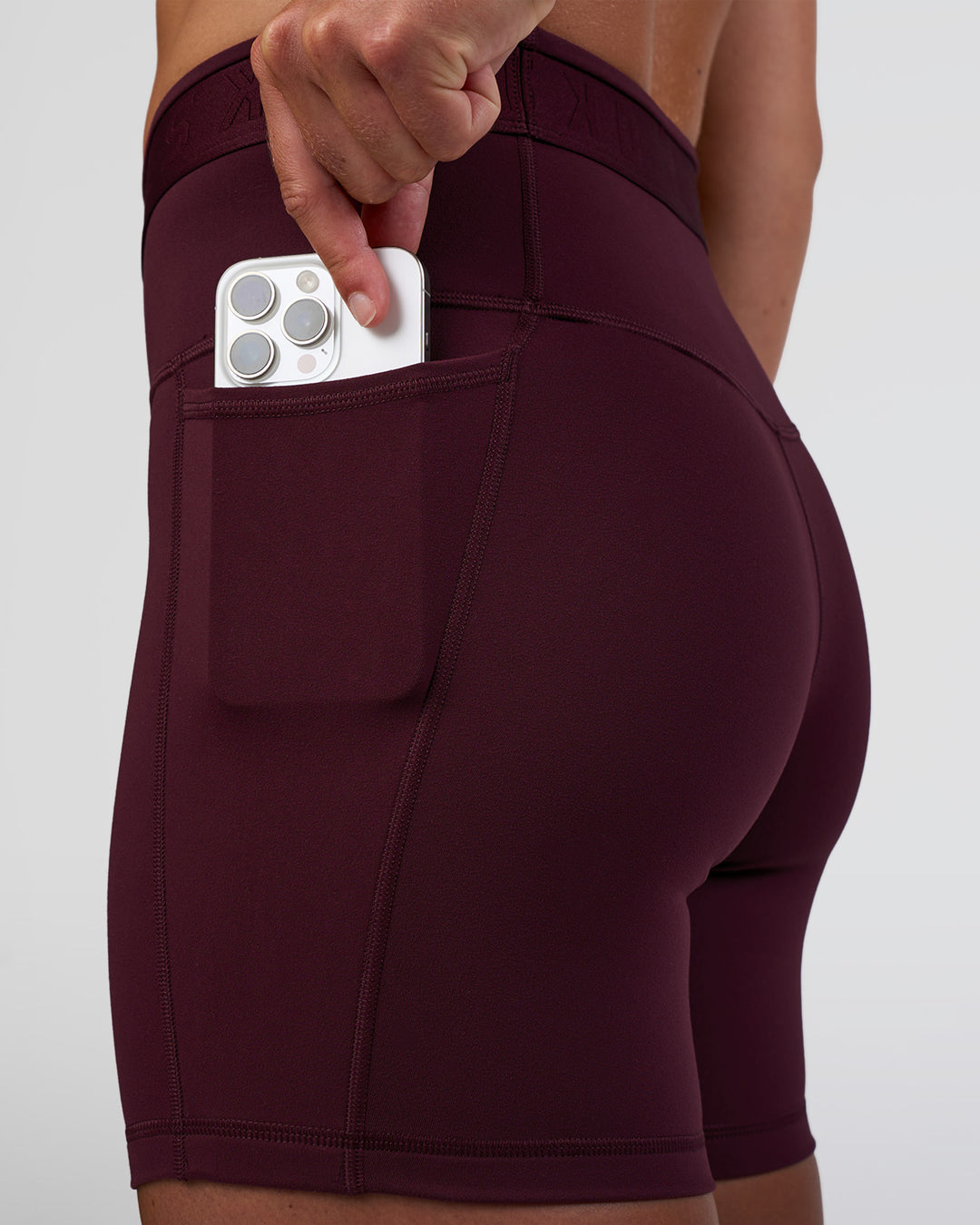 Woman wearing Fusion Jacquard High-Rise 6" Short Pockets - Cherry Lacquer | Model:Sav | Size:S - view 3