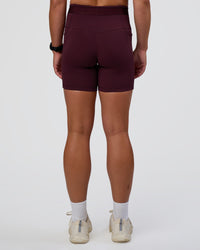 Woman wearing Fusion Jacquard High-Rise 6" Short Pockets - Cherry Lacquer | Model:Sav | Size:S | Thumbnail Index: 3