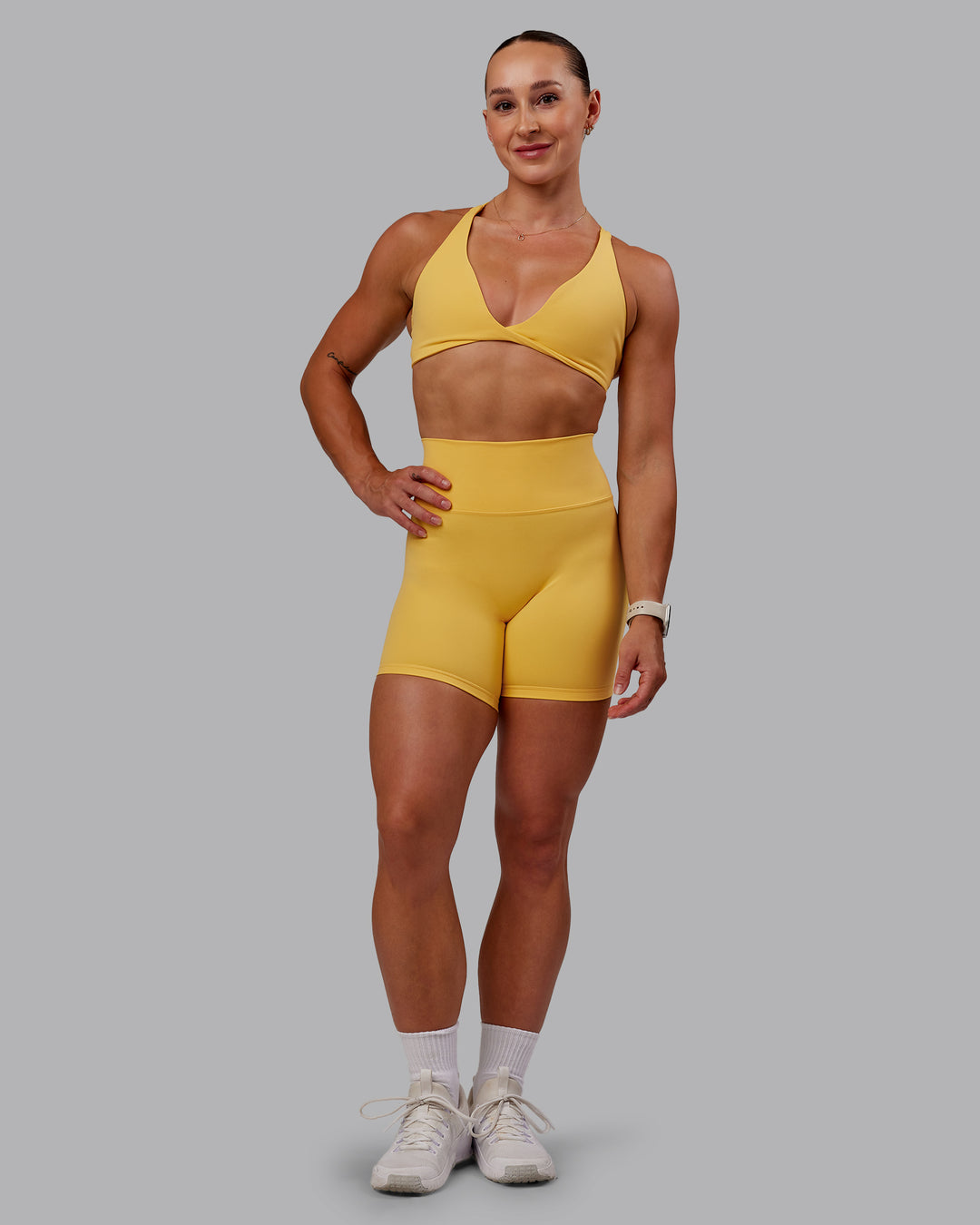 Woman wearing Fusion Ultra High-Rise 6" Short - Banana Cream | Model:Amber | Size:S - view 5