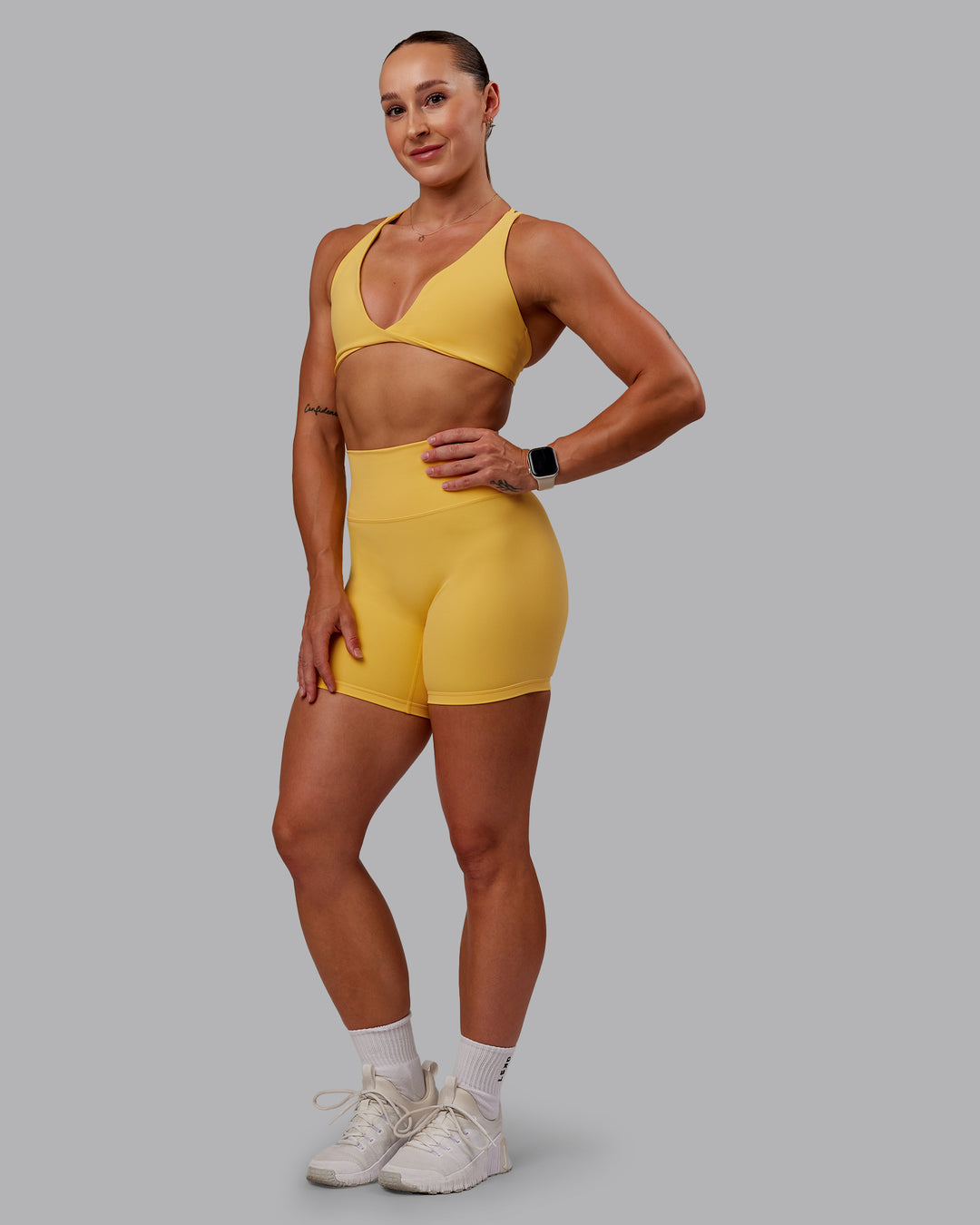 Woman wearing Fusion Ultra High-Rise 6" Short - Banana Cream | Model:Amber | Size:S - view 6