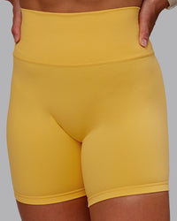 Woman wearing Fusion Ultra High-Rise 6" Short - Banana Cream | Model:Amber | Size:S | Thumbnail Index: 9