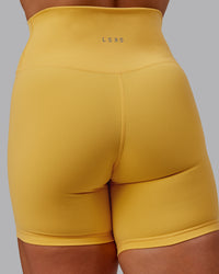 Woman wearing Fusion Ultra High-Rise 6" Short - Banana Cream | Model:Amber | Size:S | Thumbnail Index: 7