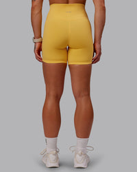 Woman wearing Fusion Ultra High-Rise 6" Short - Banana Cream | Model:Amber | Size:S | Thumbnail Index: 6