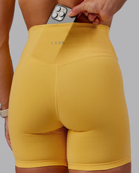 Woman wearing Fusion Ultra High-Rise 6" Short - Banana Cream | Model:Amber | Size:S | Thumbnail Index: 3