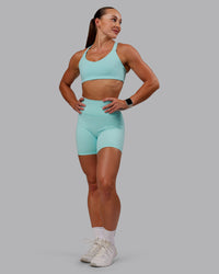 Woman wearing Fusion Ultra High-Rise 6" Short - Island Paradise | Model:Amber | Size:S | Thumbnail Index: 6