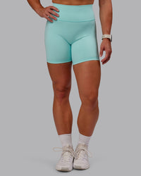 Woman wearing Fusion Ultra High-Rise 6" Short - Island Paradise | Model:Amber | Size:S | Thumbnail Index: 0