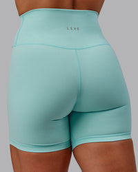 Woman wearing Fusion Ultra High-Rise 6" Short - Island Paradise | Model:Amber | Size:S | Thumbnail Index: 9