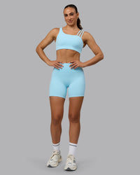 Woman wearing Fusion Ultra High-Rise 6" Short Pockets - Crystal Blue | Model:Sophie | Size:S | Thumbnail Index: 3