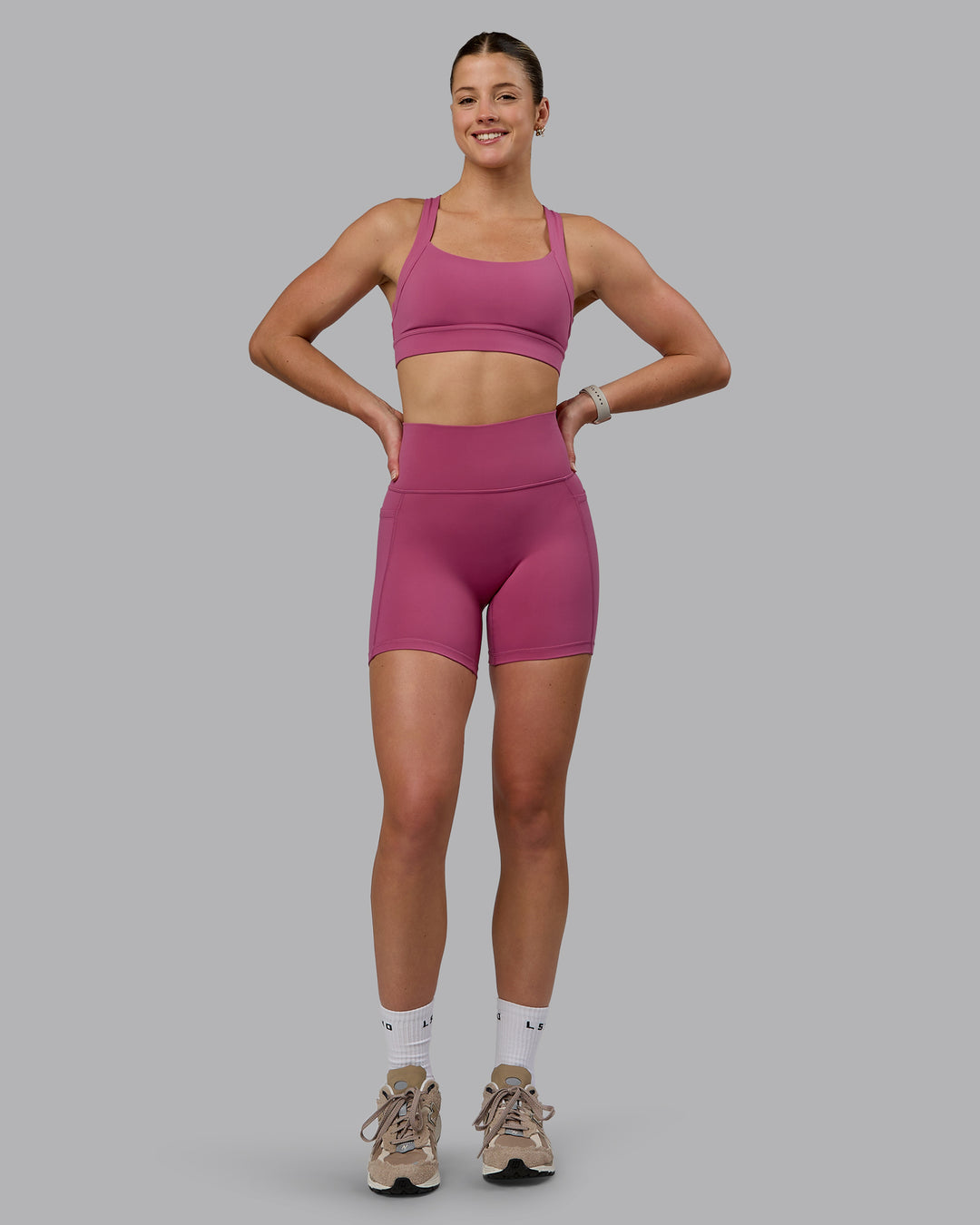 Woman wearing Fusion Ultra High-Rise 6" Short Pockets - Mauve Haze | Model:Chloe | Size:XS - view 5