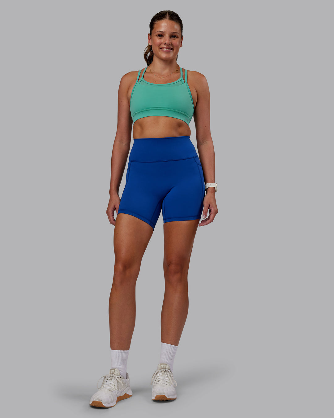Woman wearing Fusion Ultra High-Rise 6" Short Pockets - Blue Quartz | Model:Phoebe | Size:S - view 6